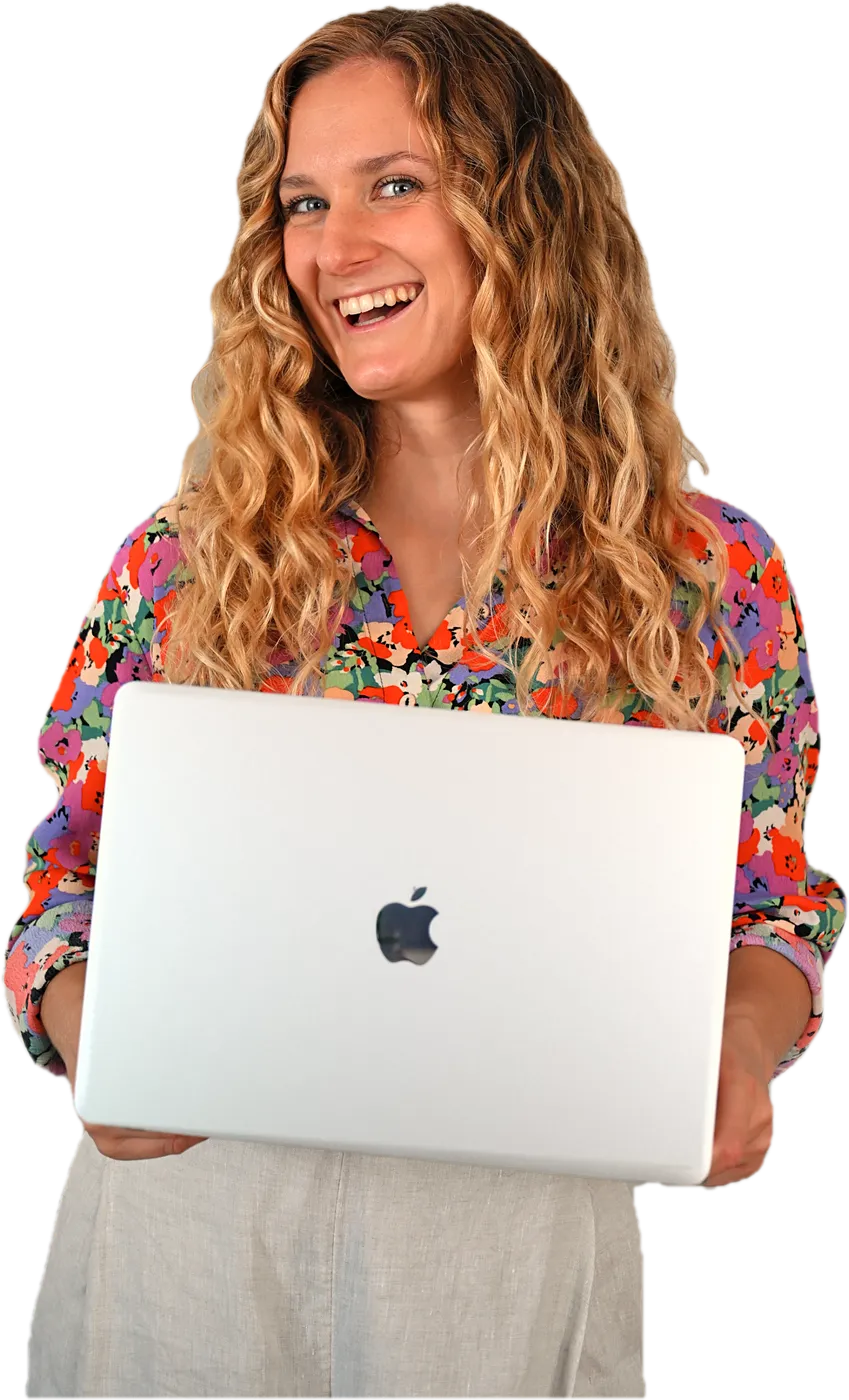 Eleonora laughing, holding up her laptop